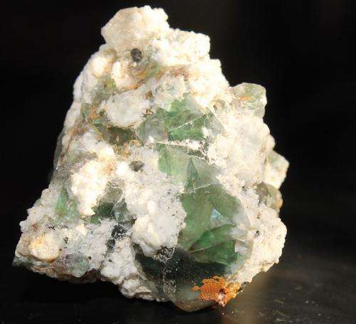Clear green flourite crystals on Feldspar
